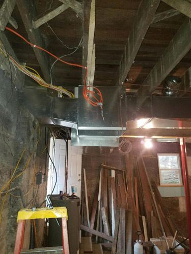 duct work being installed for new heat and air units